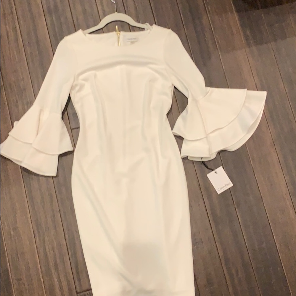 White Calvin Klein bell sleeve dress